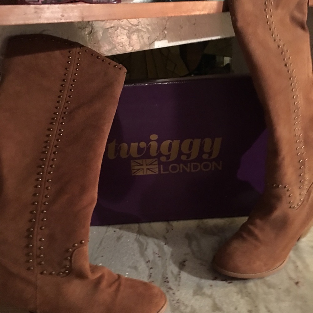 Designer knee high boots